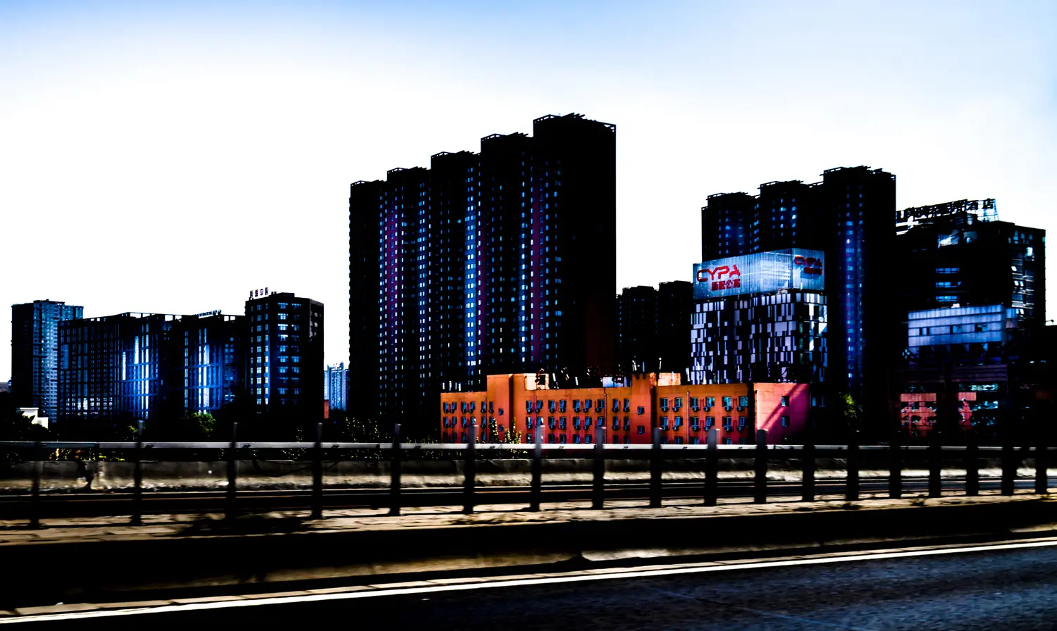 Beijing apartment buildings neon signs night photography