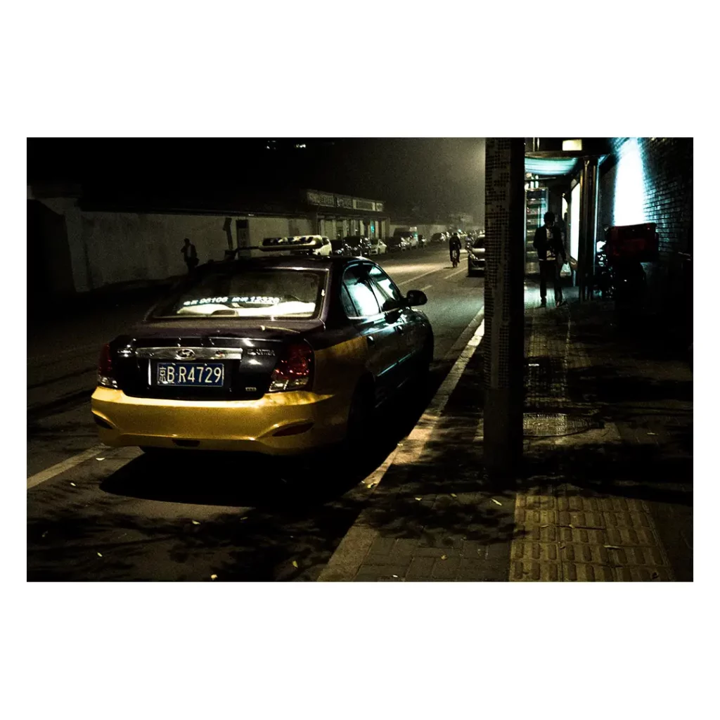 beijing night yellow taxi street french photographer