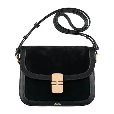 Photographie packshot d’un sac noir cuir et veau velour, vue face, sur fond blanc.